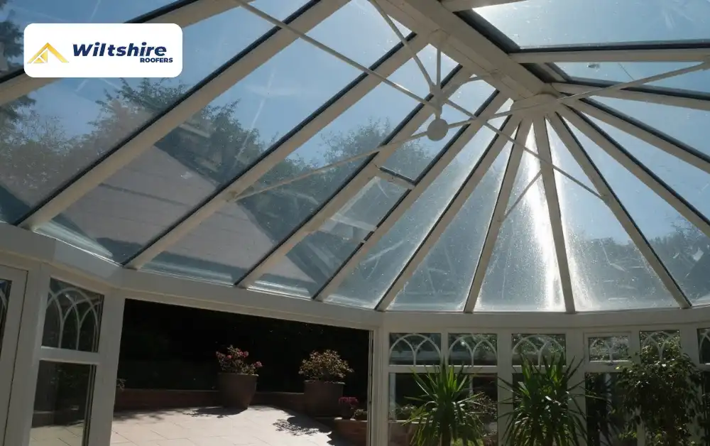 Solar control film on conservatory roof reducing heat in summer, keeping UK home interior cool and comfortable.